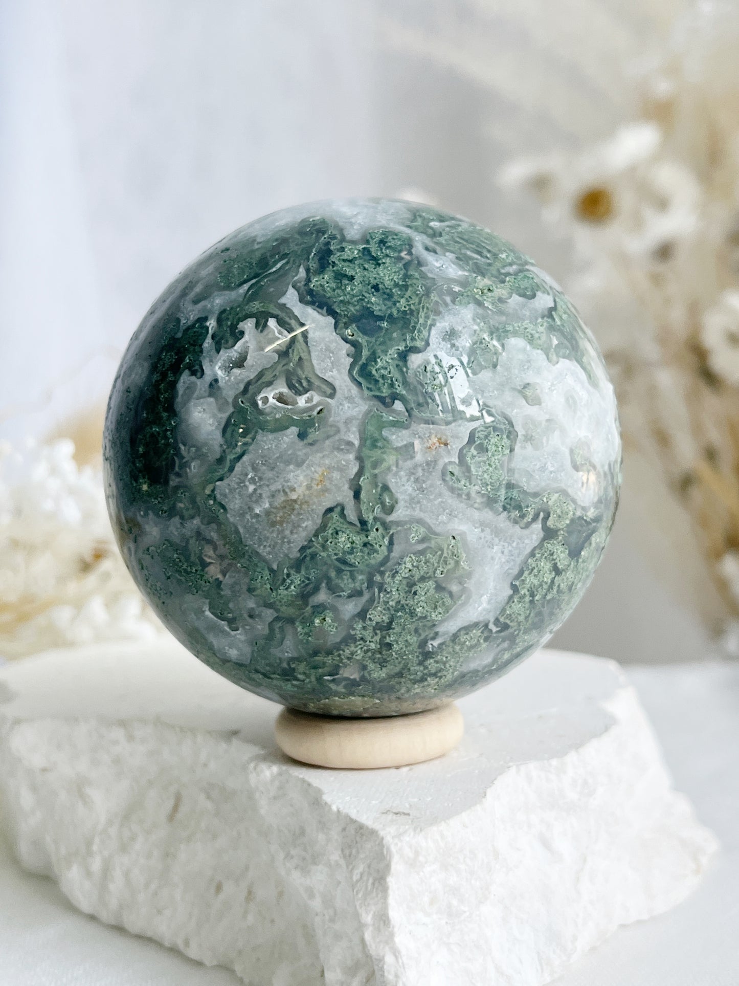 MOSS AGATE SPHERE APPROX 6.4CM. STONED AND SAGED AUSTRALIA.