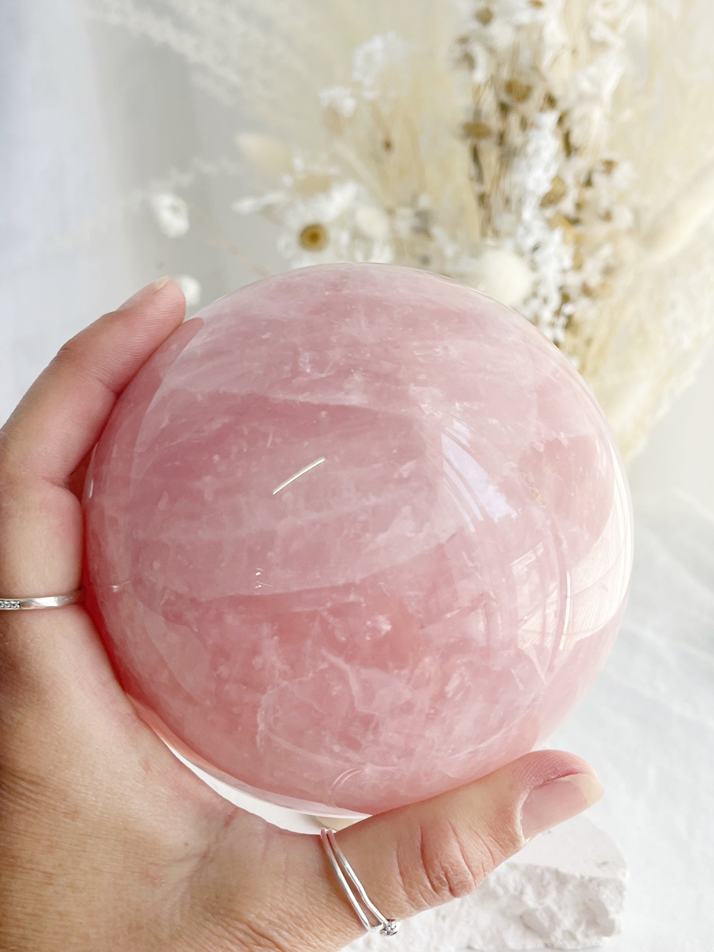 ROSE QUARTZ SPHERE APPROX 10CM. STONED AND SAGED AUSTRALIA.