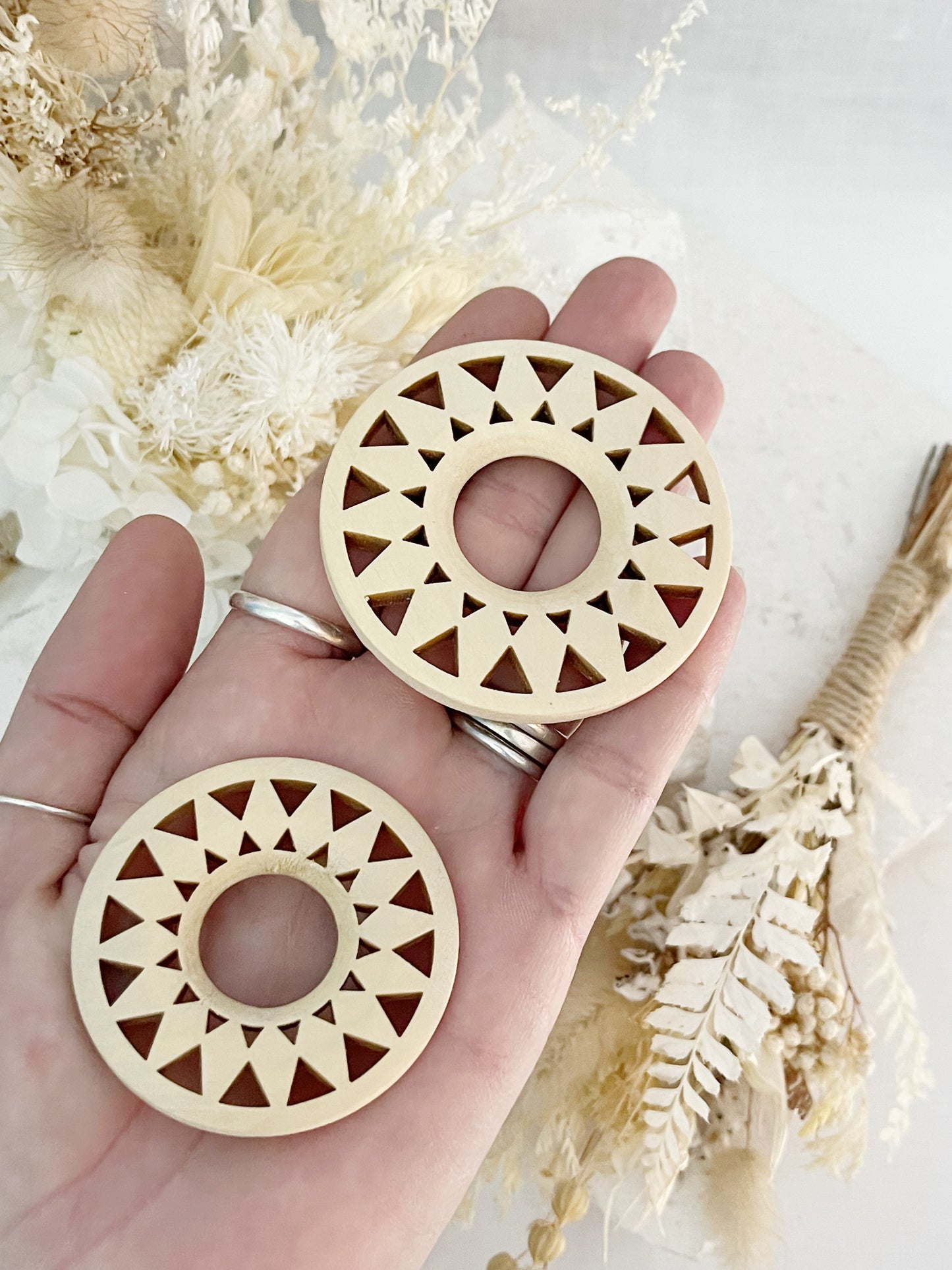 WOODEN CUT OUT SPHERE STAND
