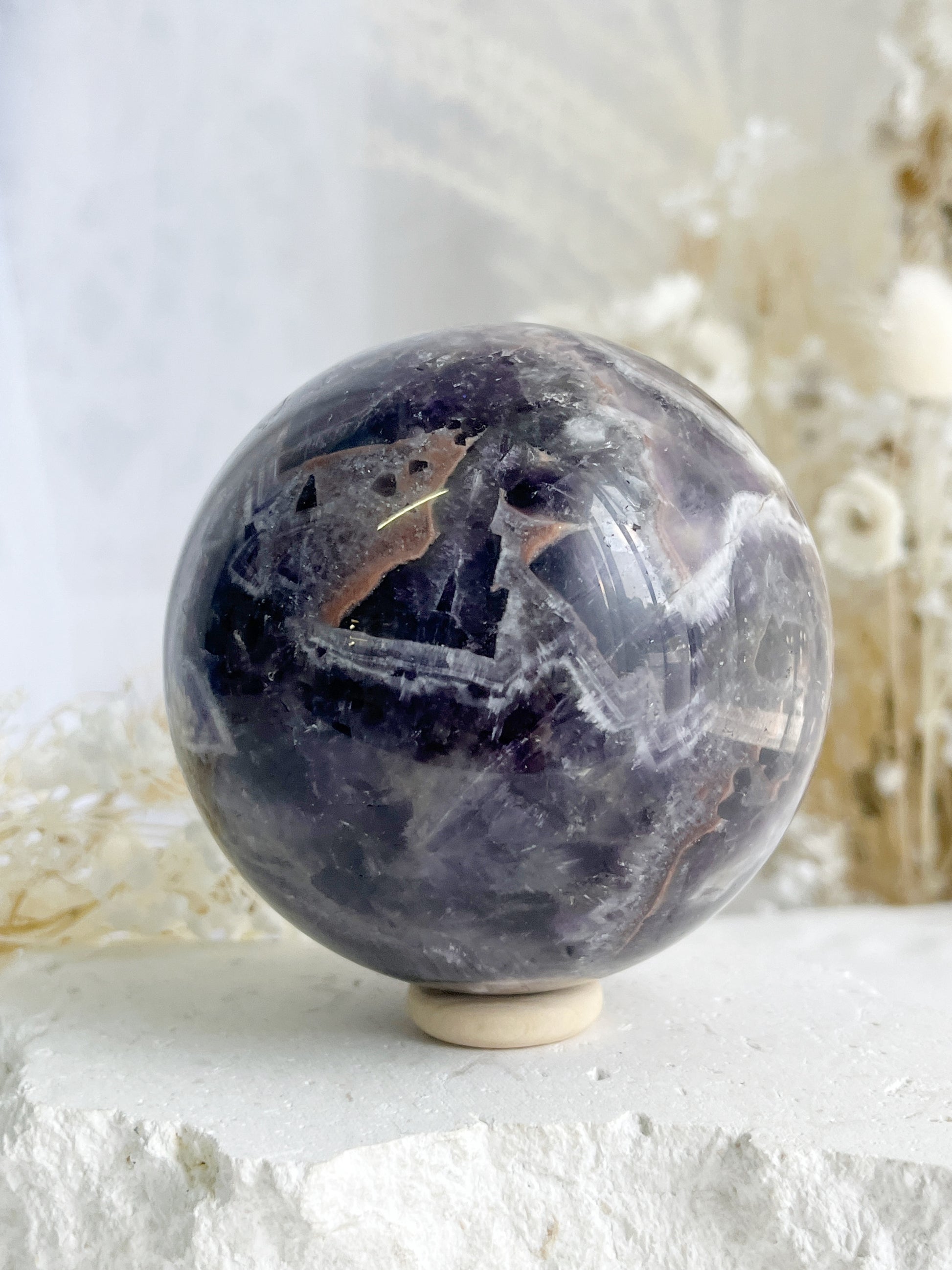 DREAM AMETHYST SPHERE APPROX 7.9CM. STONED AND SAGED AUSTRALIA.