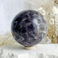 DREAM AMETHYST SPHERE APPROX 7.9CM. STONED AND SAGED AUSTRALIA.