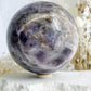 DREAM AMETHYST SPHERE APPROX 11CM. STONED AND SAGED AUSTRALIA.