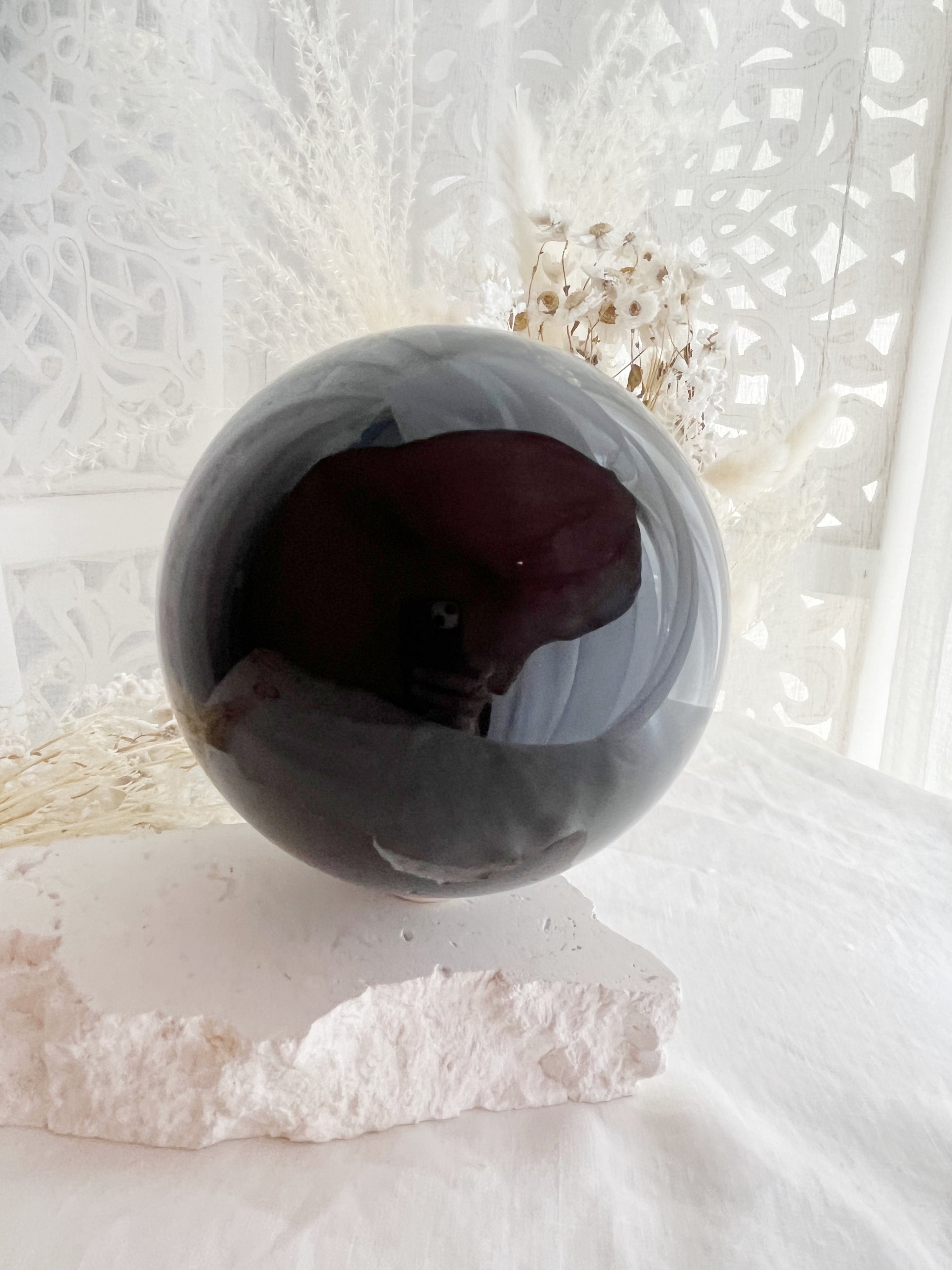 BLACK OBSIDIAN SPHERE APPROX 11.5CM. STONED AND SAGED AUSTRALIA.