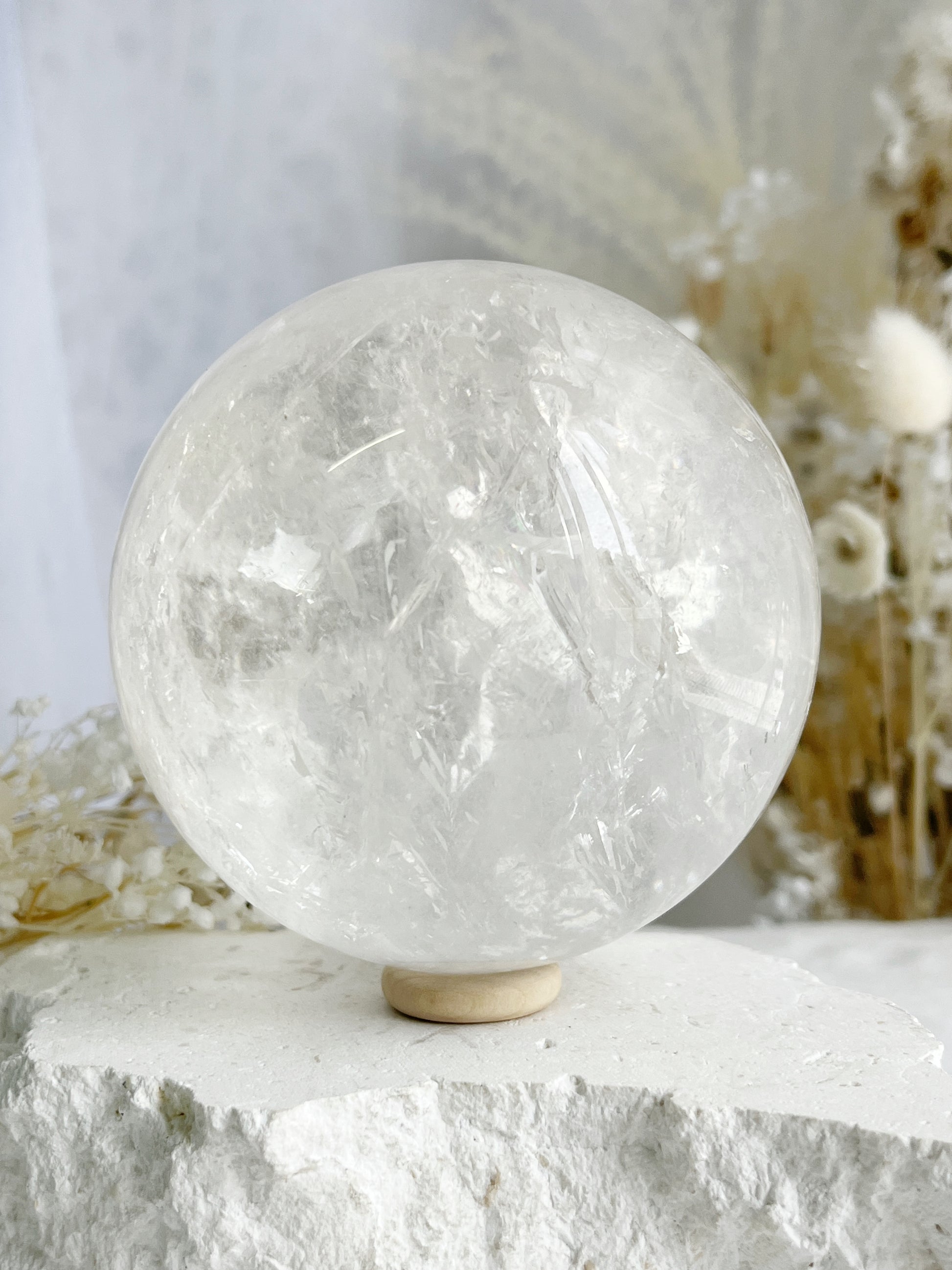 CLEAR QUARTZ SPHERE 9.1CM APPROX. STONED AND SAGED AUSTRALIA.