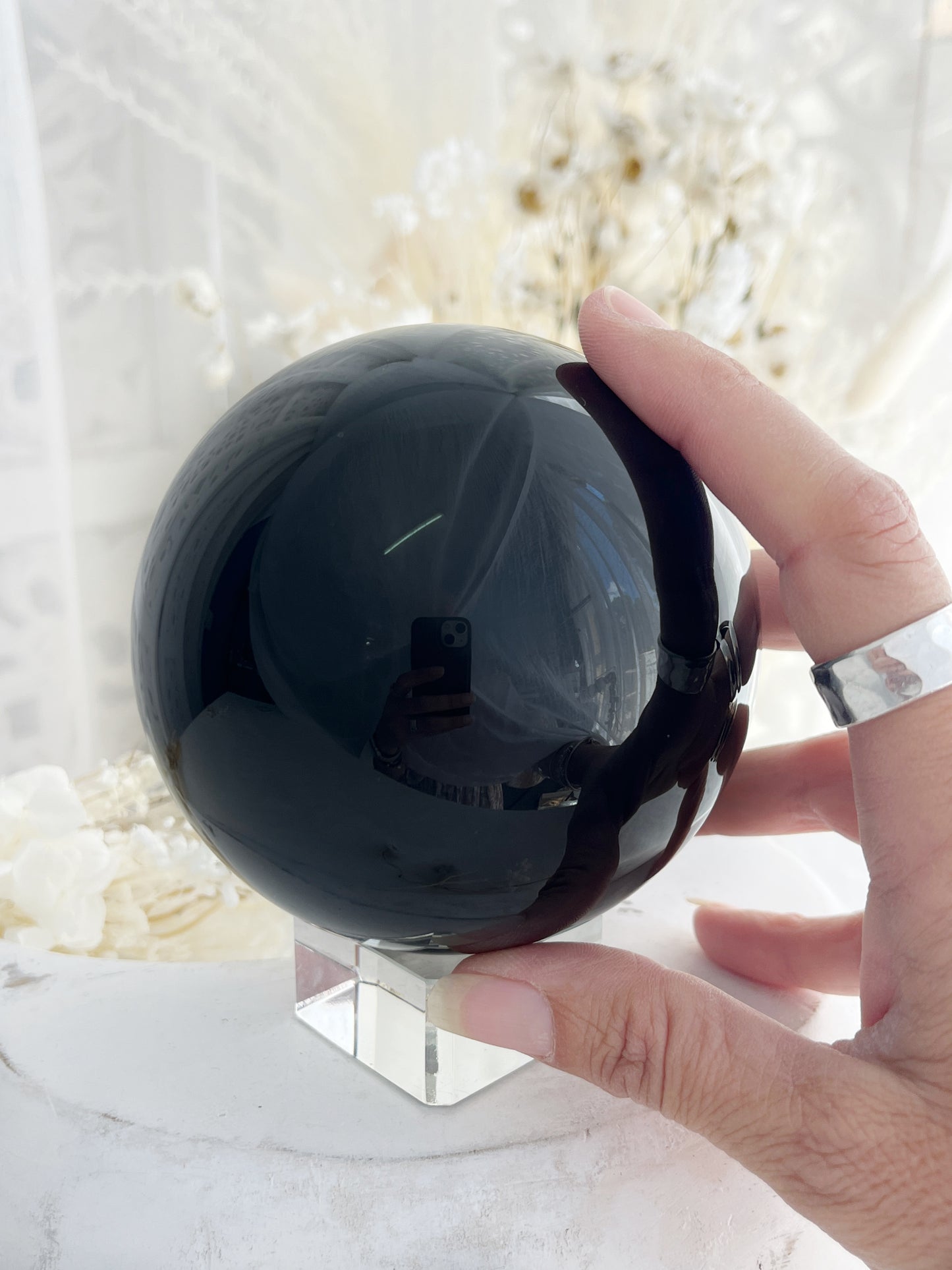 BLACK OBSIDIAN SPHERE. APPROX 9.5CM. STONED AND SAGED AUSTRALIA.