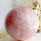 ROSE QUARTZ SPHERE APPROX 10CM. STONED AND SAGED AUSTRALIA.