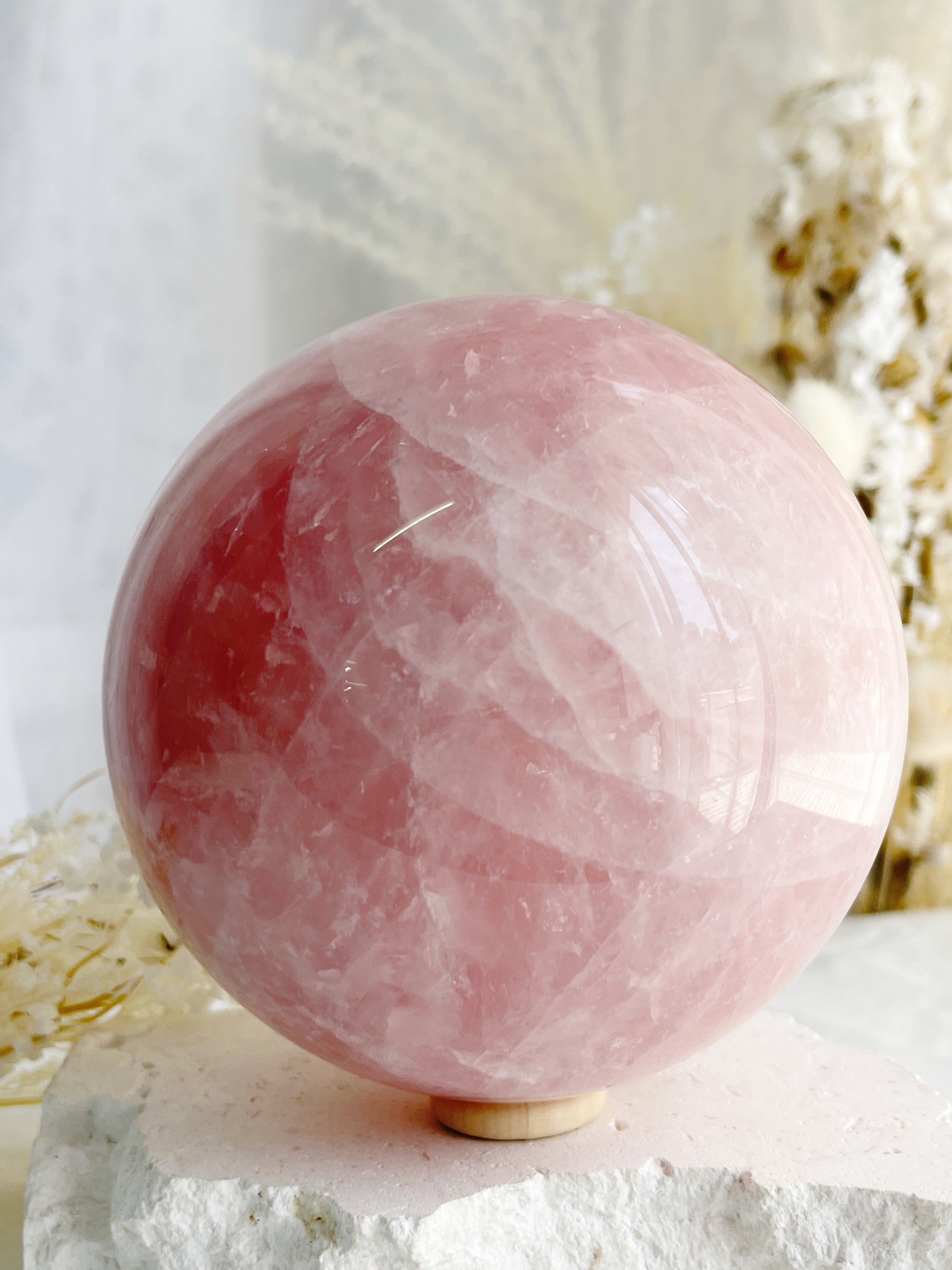 ROSE QUARTZ SPHERE APPROX 10CM. STONED AND SAGED AUSTRALIA.