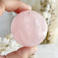 ROSE QUARTZ SPHERE APPROX 5.2CM. STONED AND SAGED AUSTRALIA.