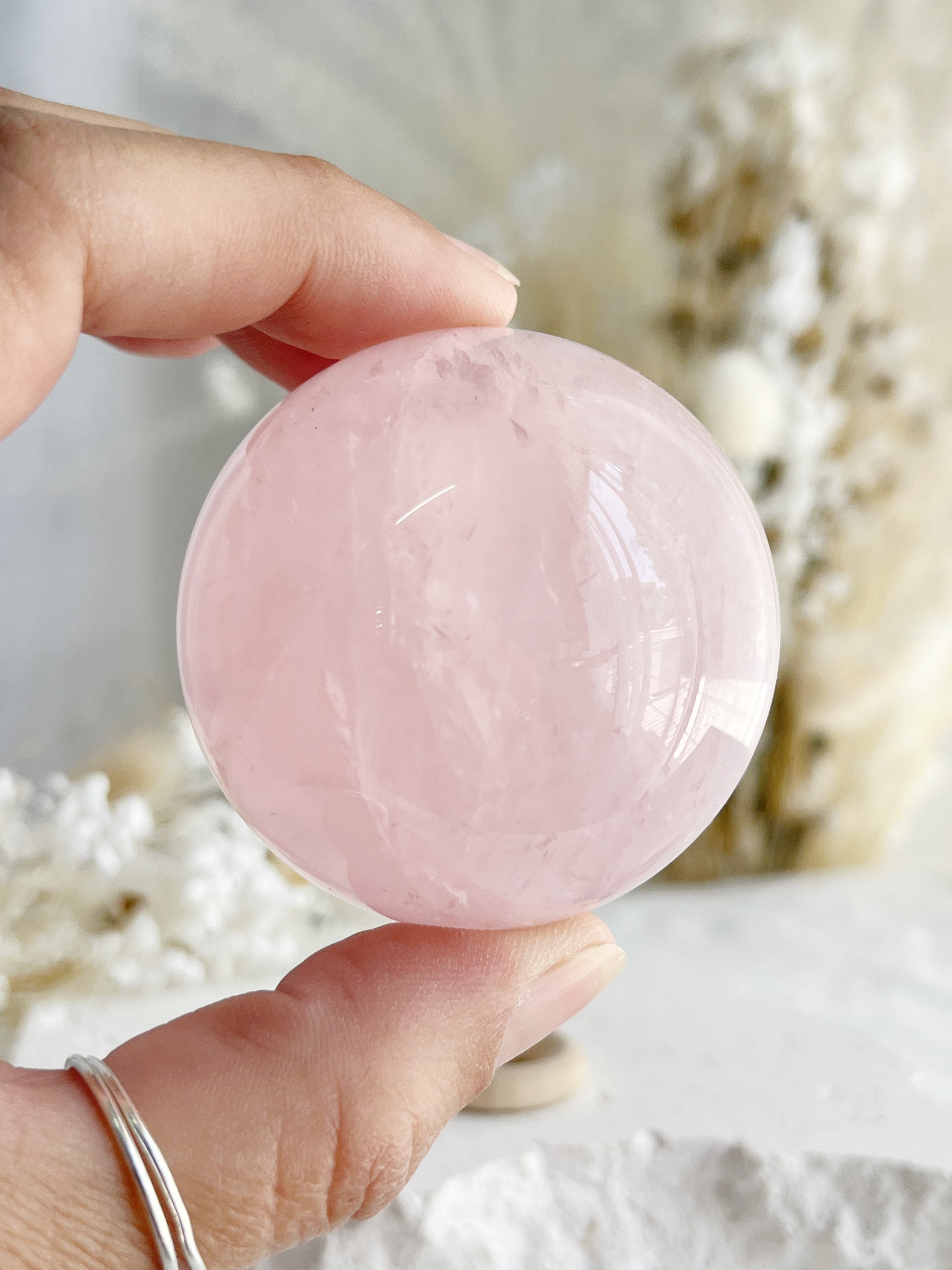 ROSE QUARTZ SPHERE APPROX 5.2CM. STONED AND SAGED AUSTRALIA.