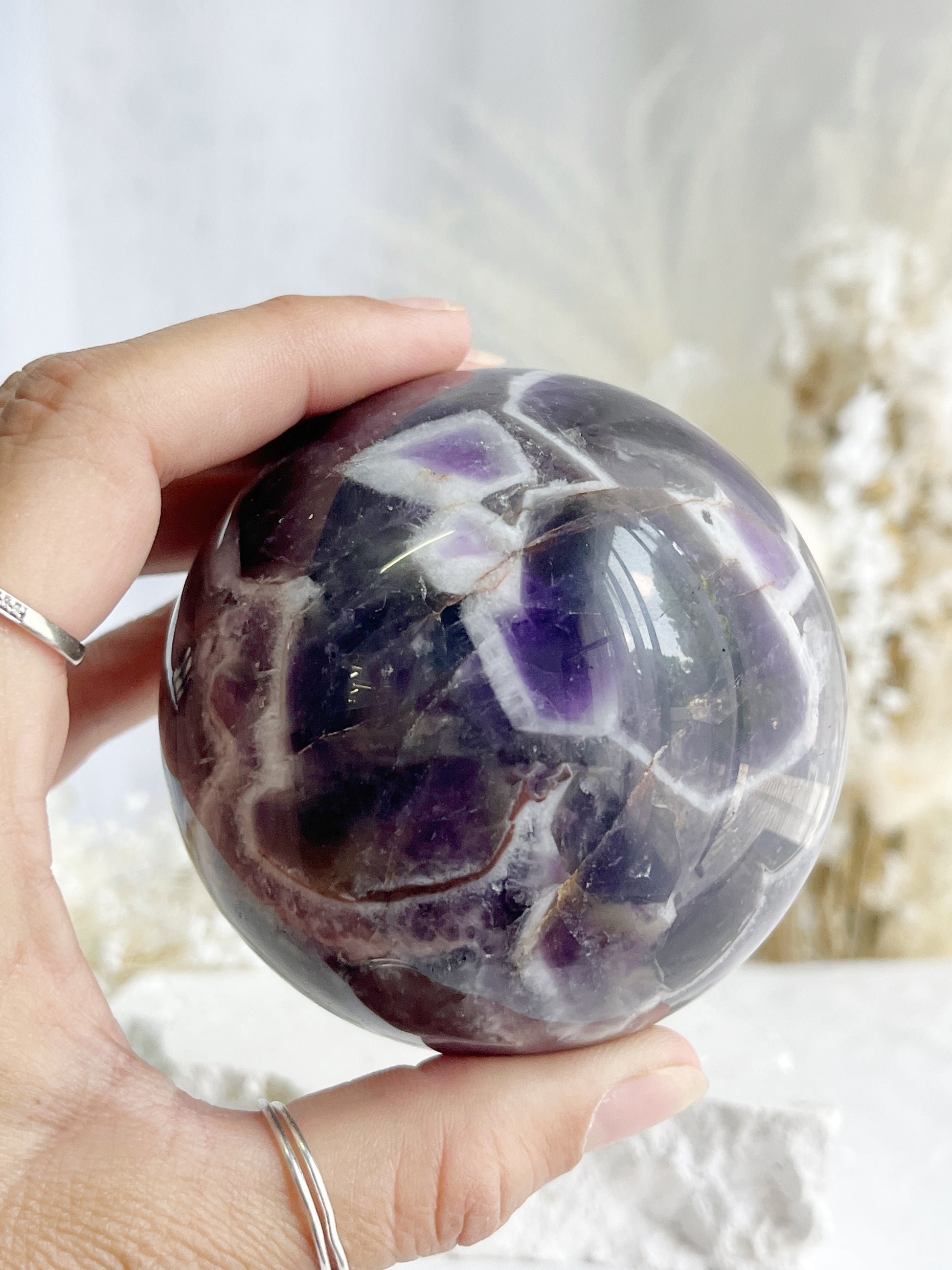 DREAM AMETHYST SPHERE APPROX 7.9CM. STONED AND SAGED AUSTRALIA.