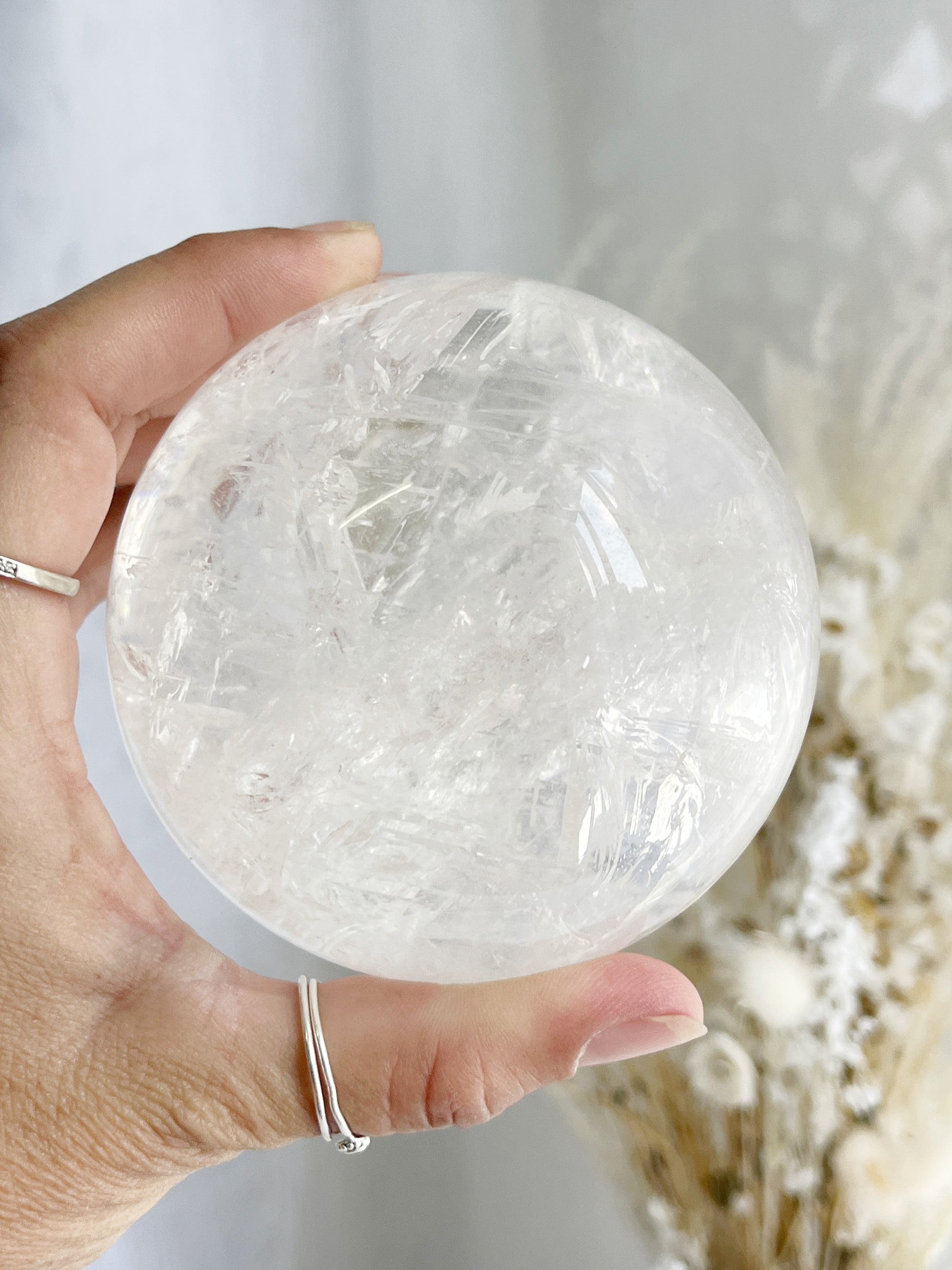 CLEAR QUARTZ SPHERE 9.1CM APPROX. STONED AND SAGED AUSTRALIA.