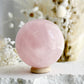 ROSE QUARTZ SPHERE APPROX 5.9CM. STONED AND SAGED AUSTRALIA.