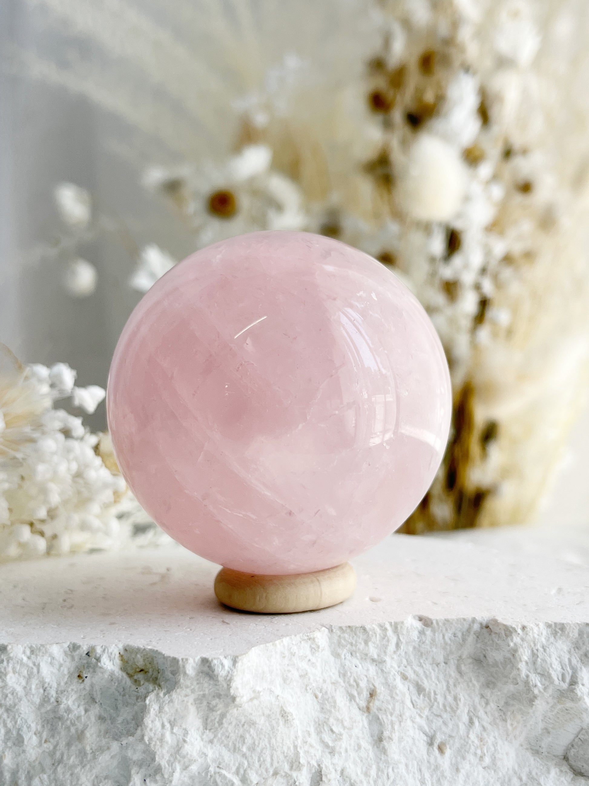 ROSE QUARTZ SPHERE APPROX 5.9CM. STONED AND SAGED AUSTRALIA.