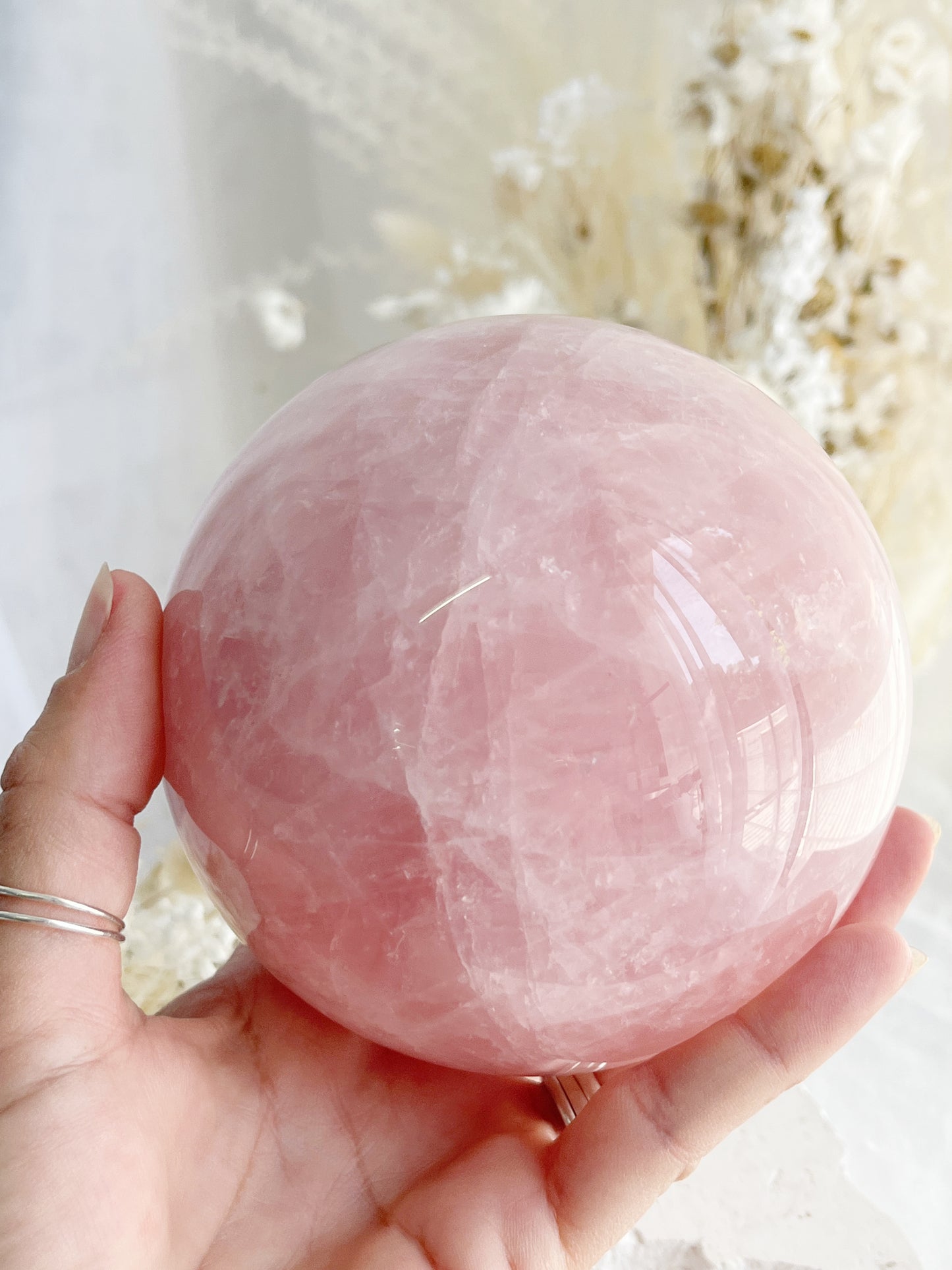 ROSE QUARTZ SPHERE APPROX 10CM. STONED AND SAGED AUSTRALIA.