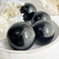 BLACK OBSIDIAN SPHERE APPROX 5.8CM. STONED AND SAGED AUSTRALIA.