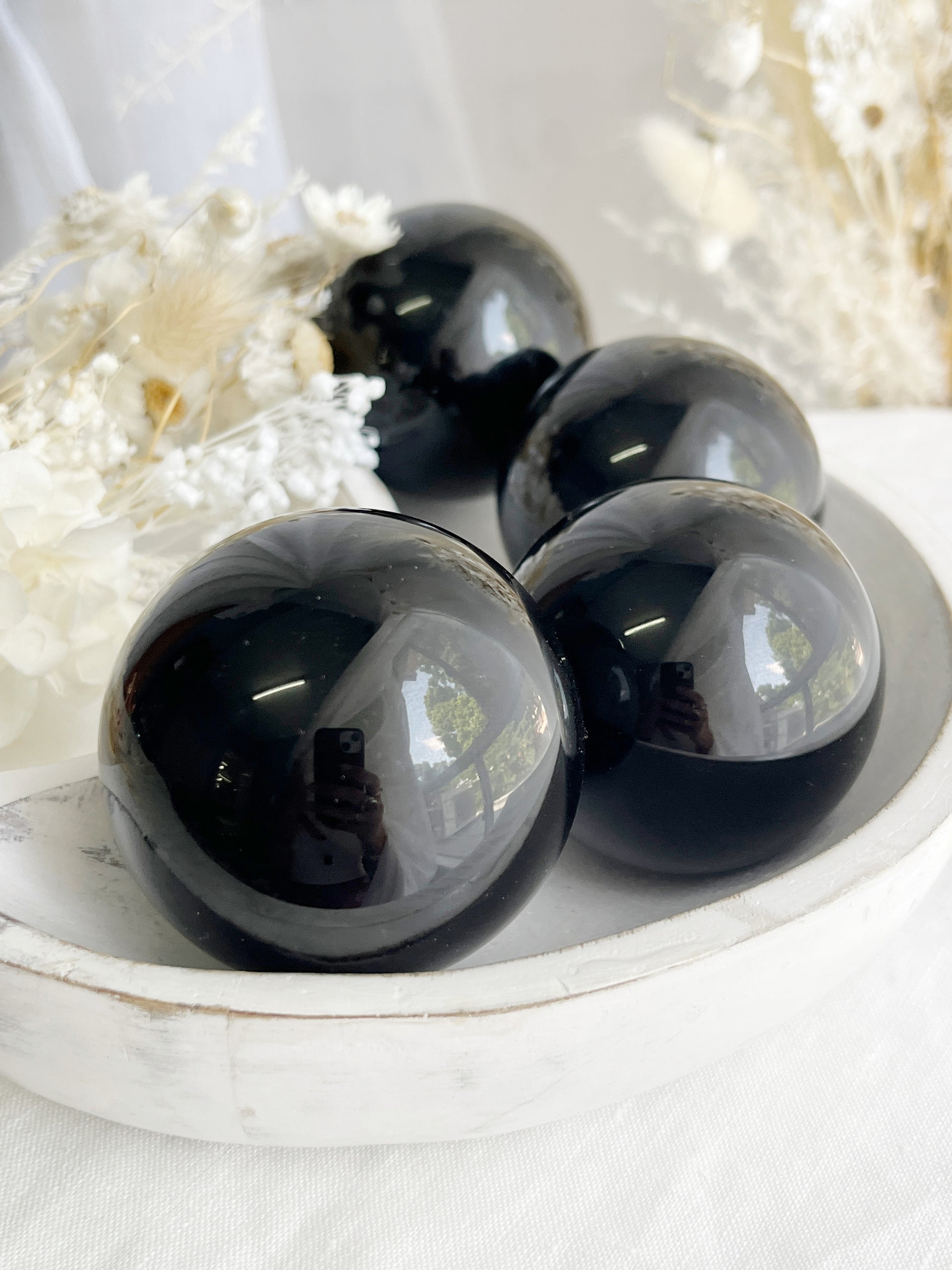 BLACK OBSIDIAN SPHERE APPROX 5.8CM. STONED AND SAGED AUSTRALIA.