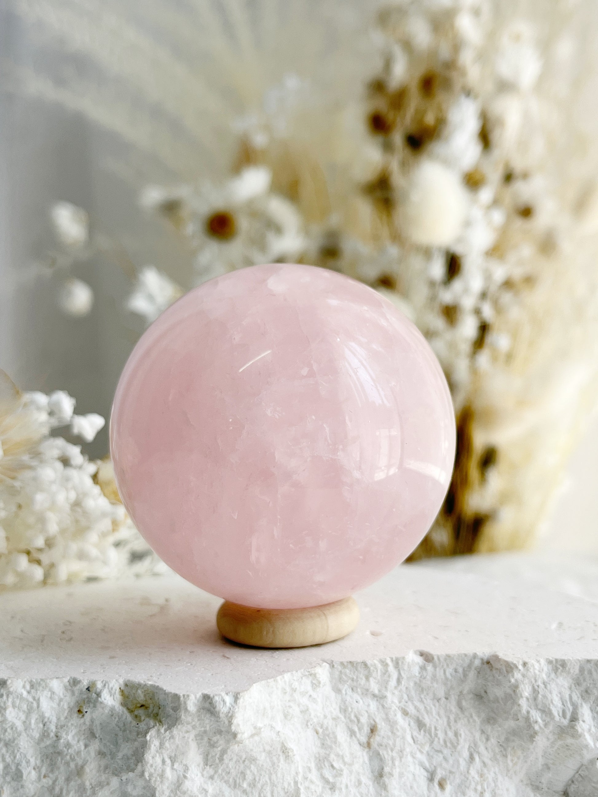 ROSE QUARTZ SPHERE APPROX 5.9CM. STONED AND SAGED AUSTRALIA.