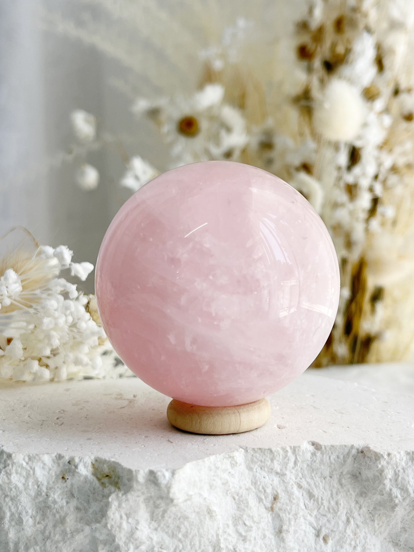 ROSE QUARTZ SPHERE APPROX 5.7CM. STONED AND SAGED AUSTRALIA.