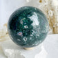 MOSS AGATE SPHERE APPROX 9CM. STONED AND SAGED AUSTRALIA