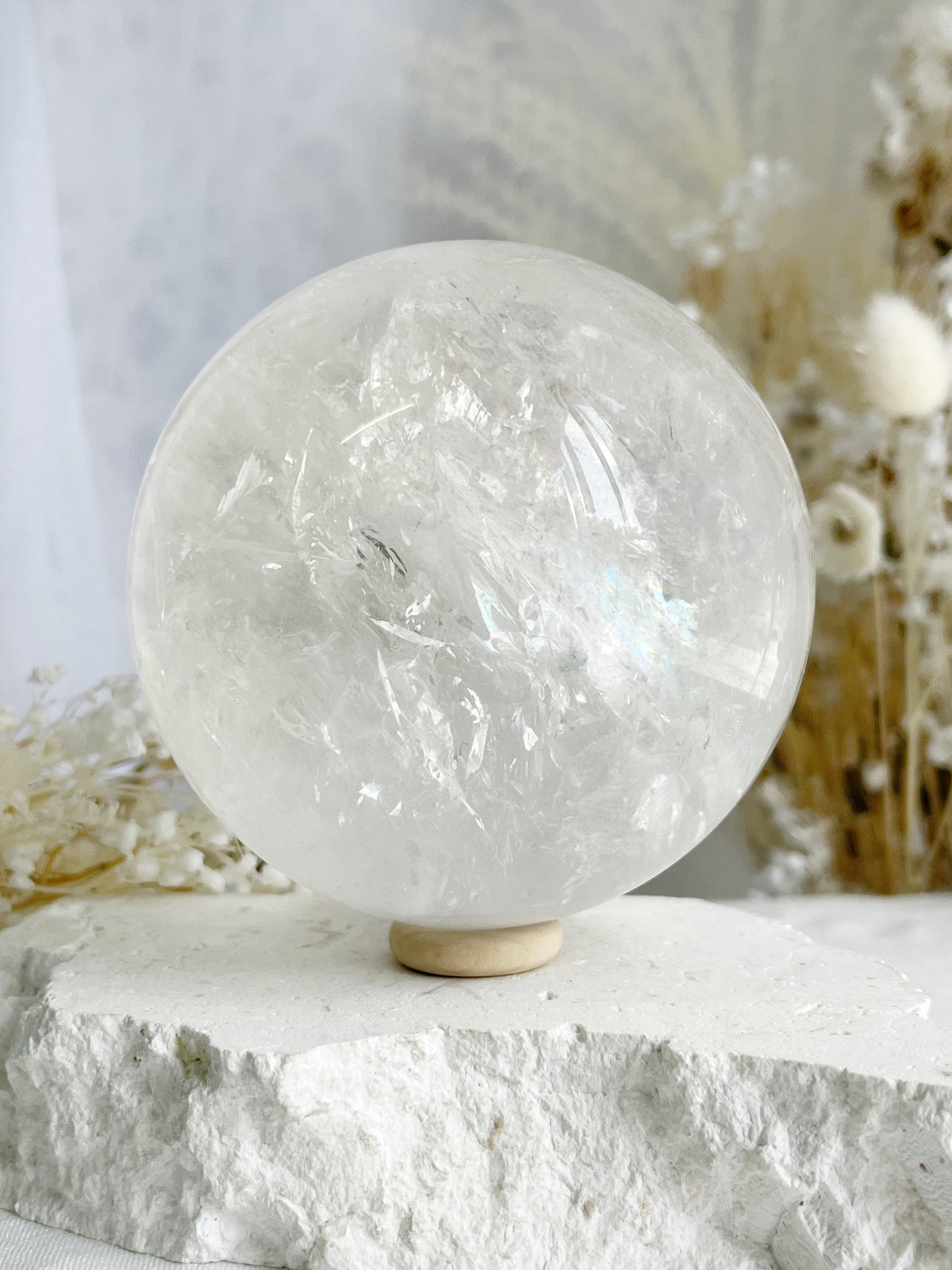 CLEAR QUARTZ SPHERE 9.1CM APPROX. STONED AND SAGED AUSTRALIA.