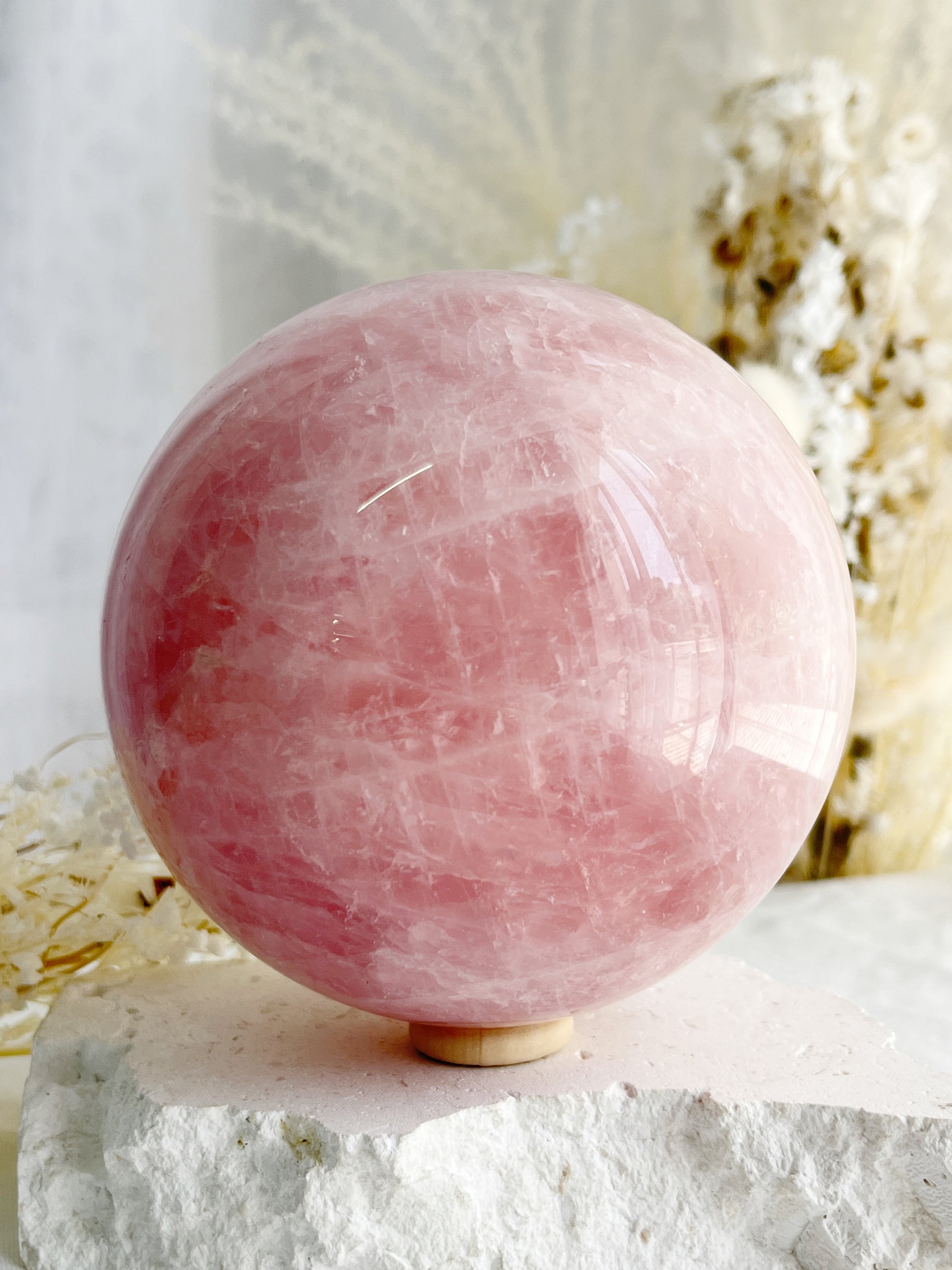 ROSE QUARTZ SPHERE APPROX 10CM. STONED AND SAGED AUSTRALIA.