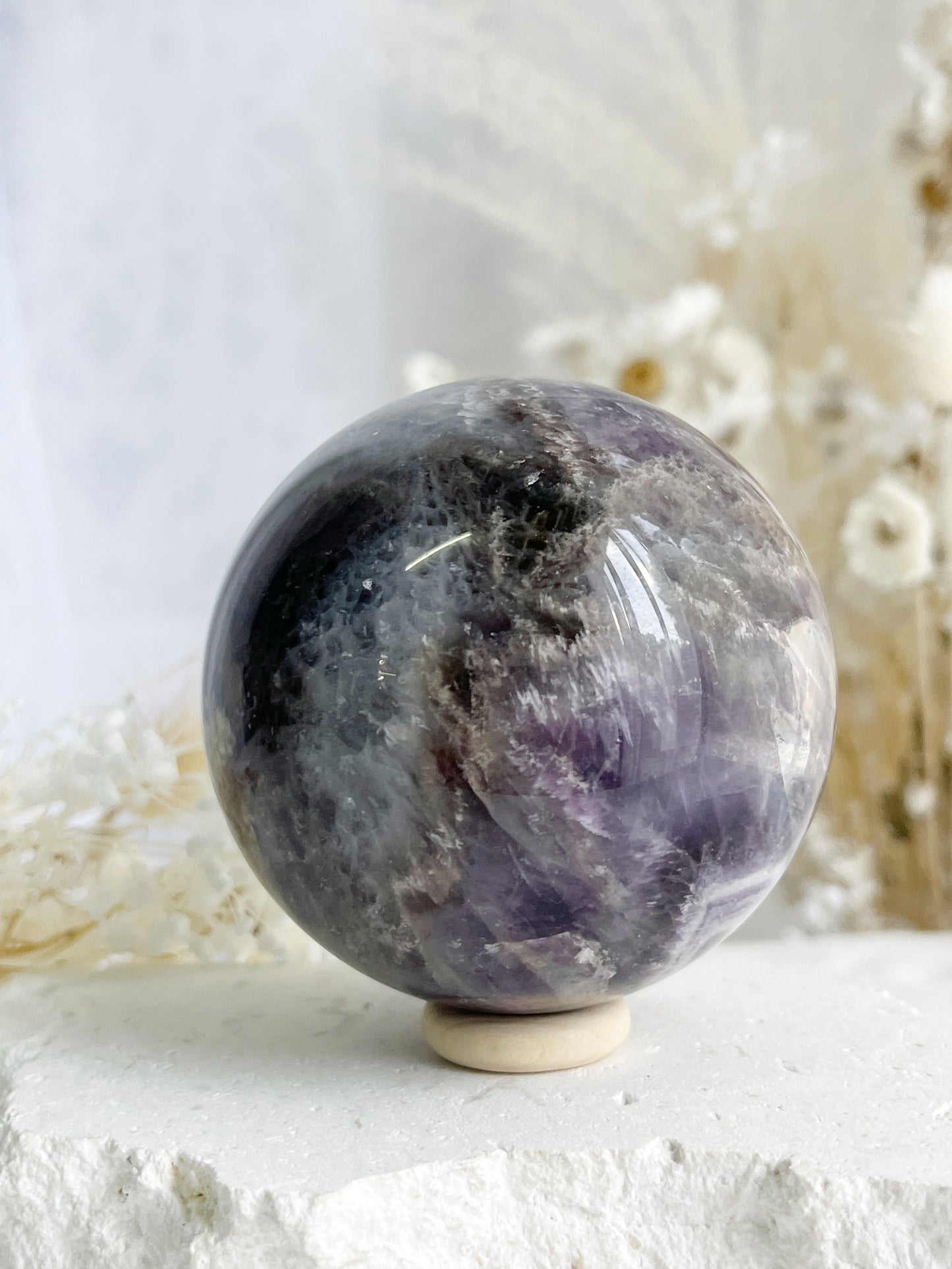 DREAM AMETHYST SPHERE APPROX 7CM. STONED AND SAGED AUSTRALIA.