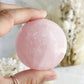 ROSE QUARTZ SPHERE APPROX 5.7CM. STONED AND SAGED AUSTRALIA.