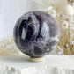 DREAM AMETHYST SPHERE APPROX 7CM. STONED AND SAGED AUSTRALIA.