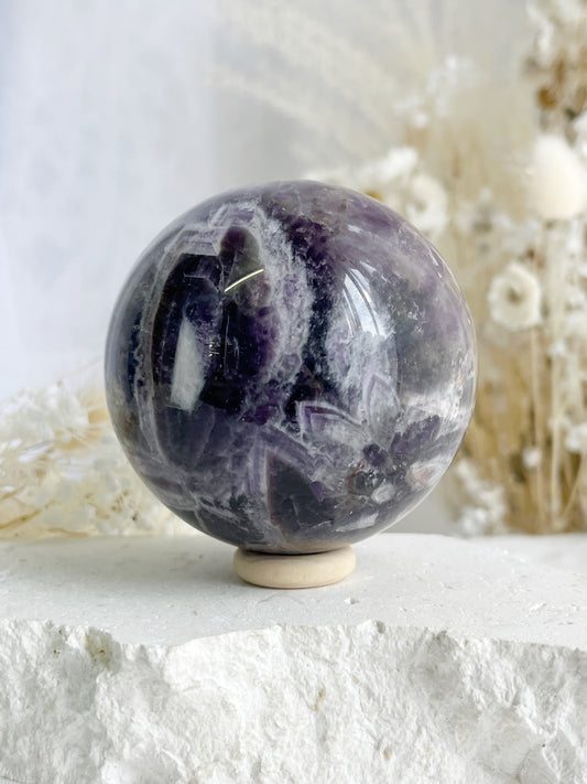 DREAM AMETHYST SPHERE APPROX 7CM. STONED AND SAGED AUSTRALIA.