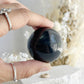 BLACK TOURMALINE SPHERE, 31048, STONED AND SAGED AUSTRALIA