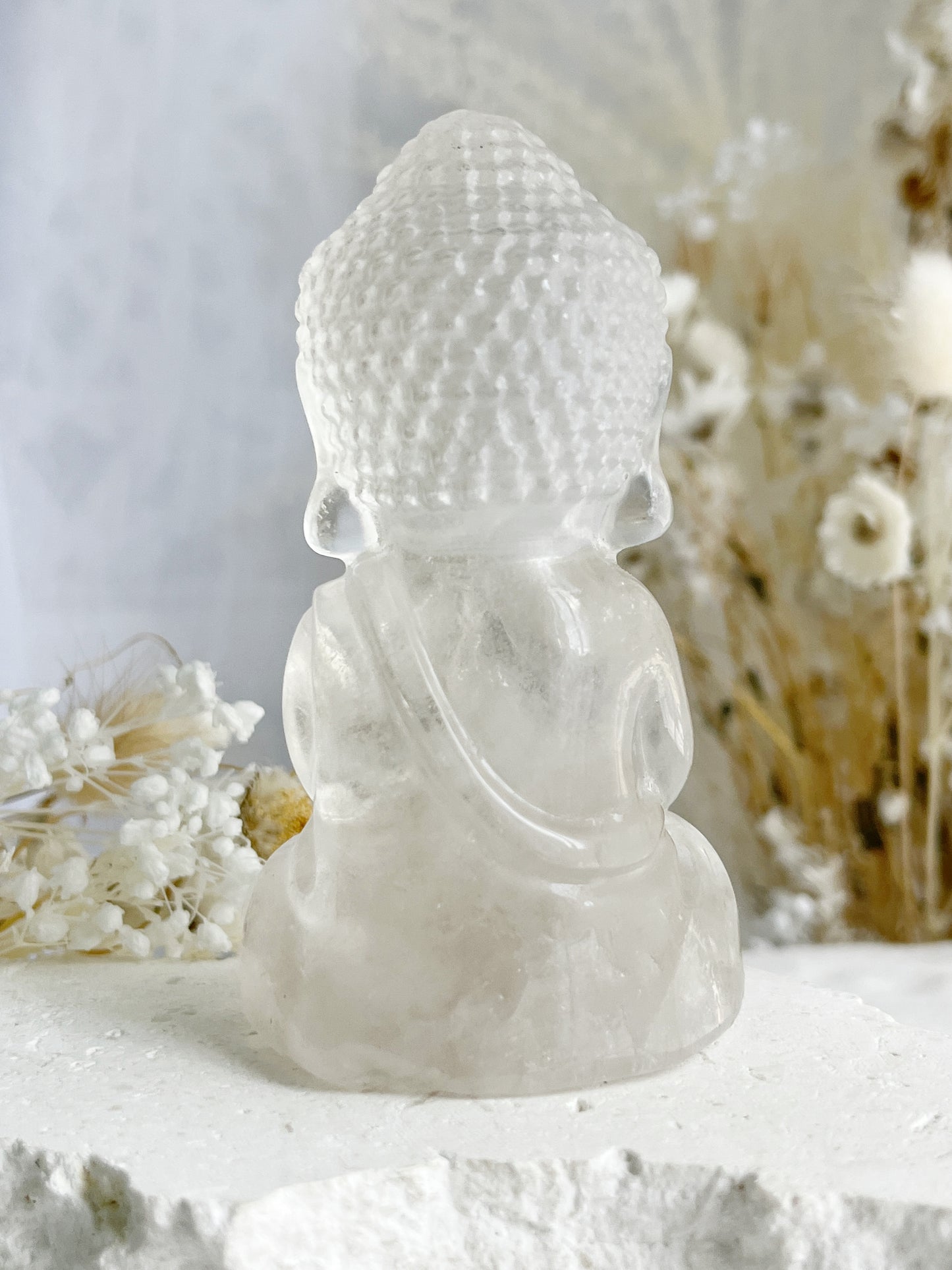 CLEAR QUARTZ BUDDHA. APPROX 10CM. STONED AND SAGED AUSTRALIA.