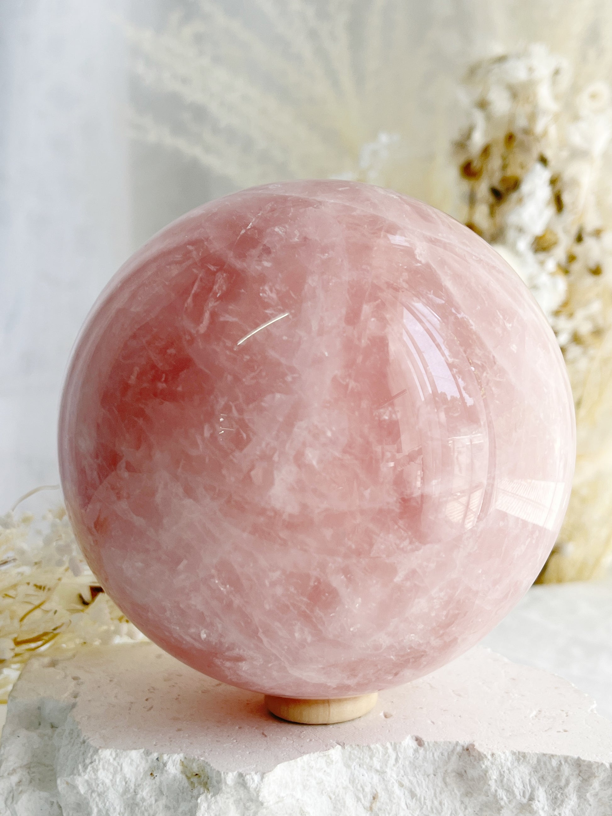 ROSE QUARTZ SPHERE APPROX 10CM. STONED AND SAGED AUSTRALIA.