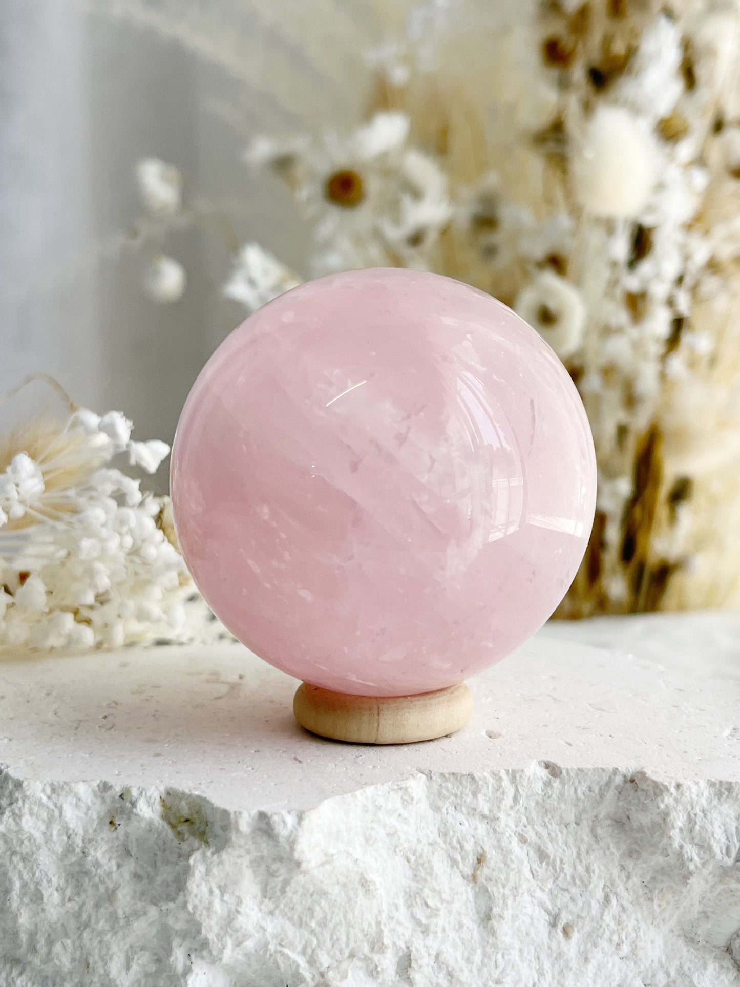 ROSE QUARTZ SPHERE APPROX 5.7CM. STONED AND SAGED AUSTRALIA.