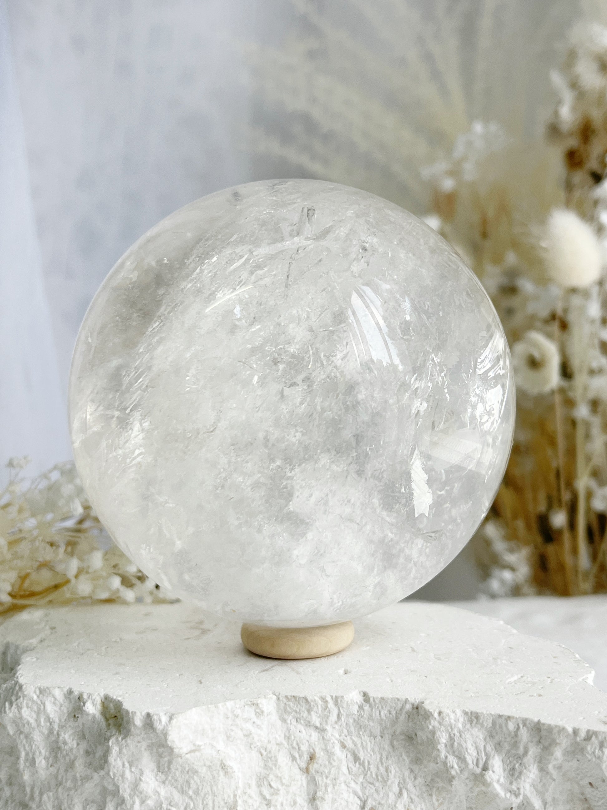 CLEAR QUARTZ SPHERE 9.1CM APPROX. STONED AND SAGED AUSTRALIA.