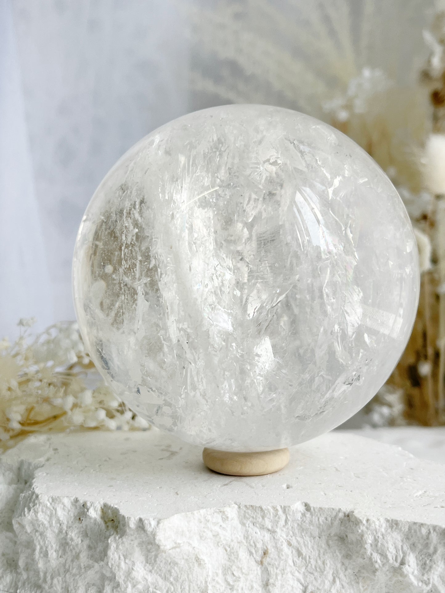 CLEAR QUARTZ SPHERE 9.1CM APPROX. STONED AND SAGED AUSTRALIA.