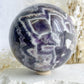 DREAM AMETHYST SPHERE APPROX 11CM. STONED AND SAGED AUSTRALIA.