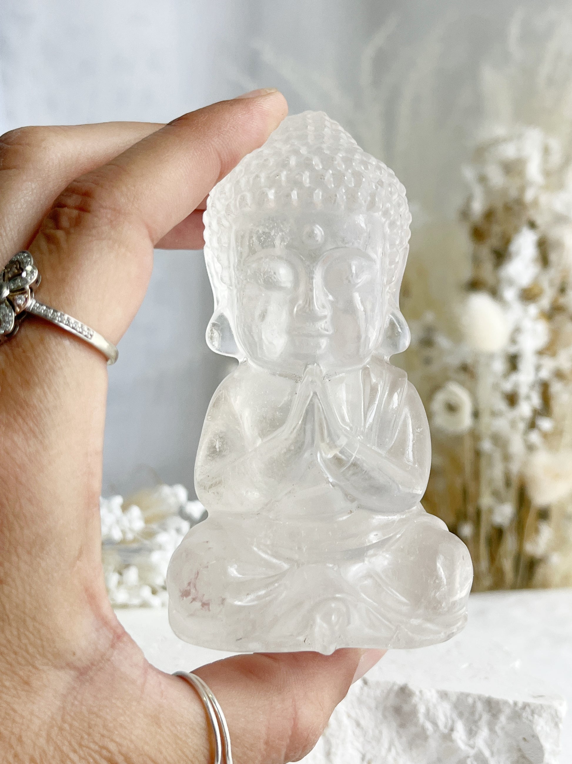 CLEAR QUARTZ BUDDHA. APPROX 10CM. STONED AND SAGED AUSTRALIA.