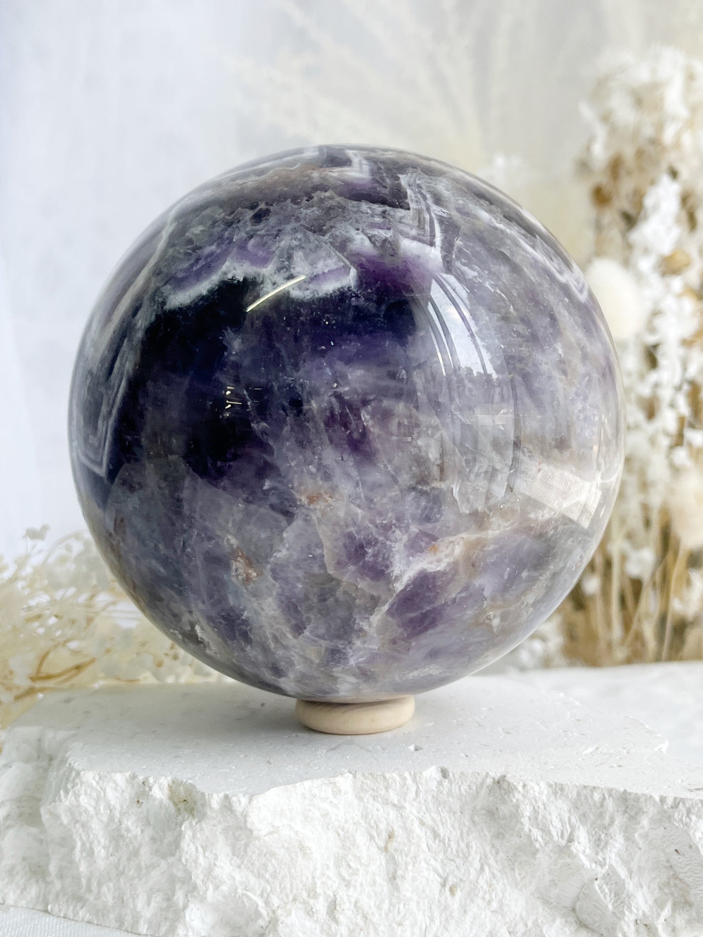 DREAM AMETHYST SPHERE APPROX 11CM. STONED AND SAGED AUSTRALIA.