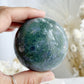 MOSS AGATE SPHERE APPROX 6.4CM. STONED AND SAGED AUSTRALIA.