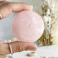 ROSE QUARTZ SPHERE APPROX 5.9CM. STONED AND SAGED AUSTRALIA.