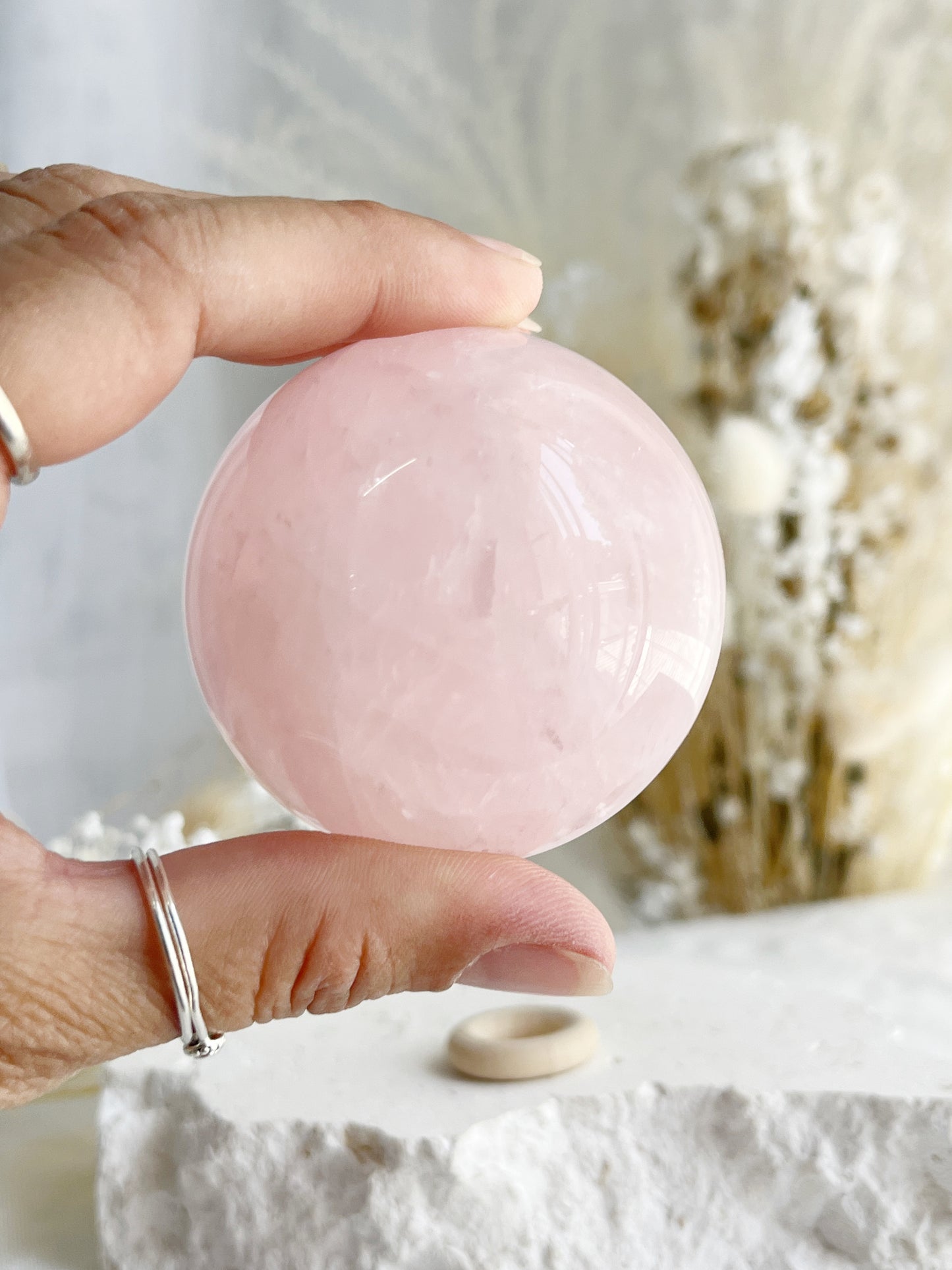 ROSE QUARTZ SPHERE APPROX 5.9CM. STONED AND SAGED AUSTRALIA.