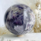 DREAM AMETHYST SPHERE APPROX 11CM. STONED AND SAGED AUSTRALIA.