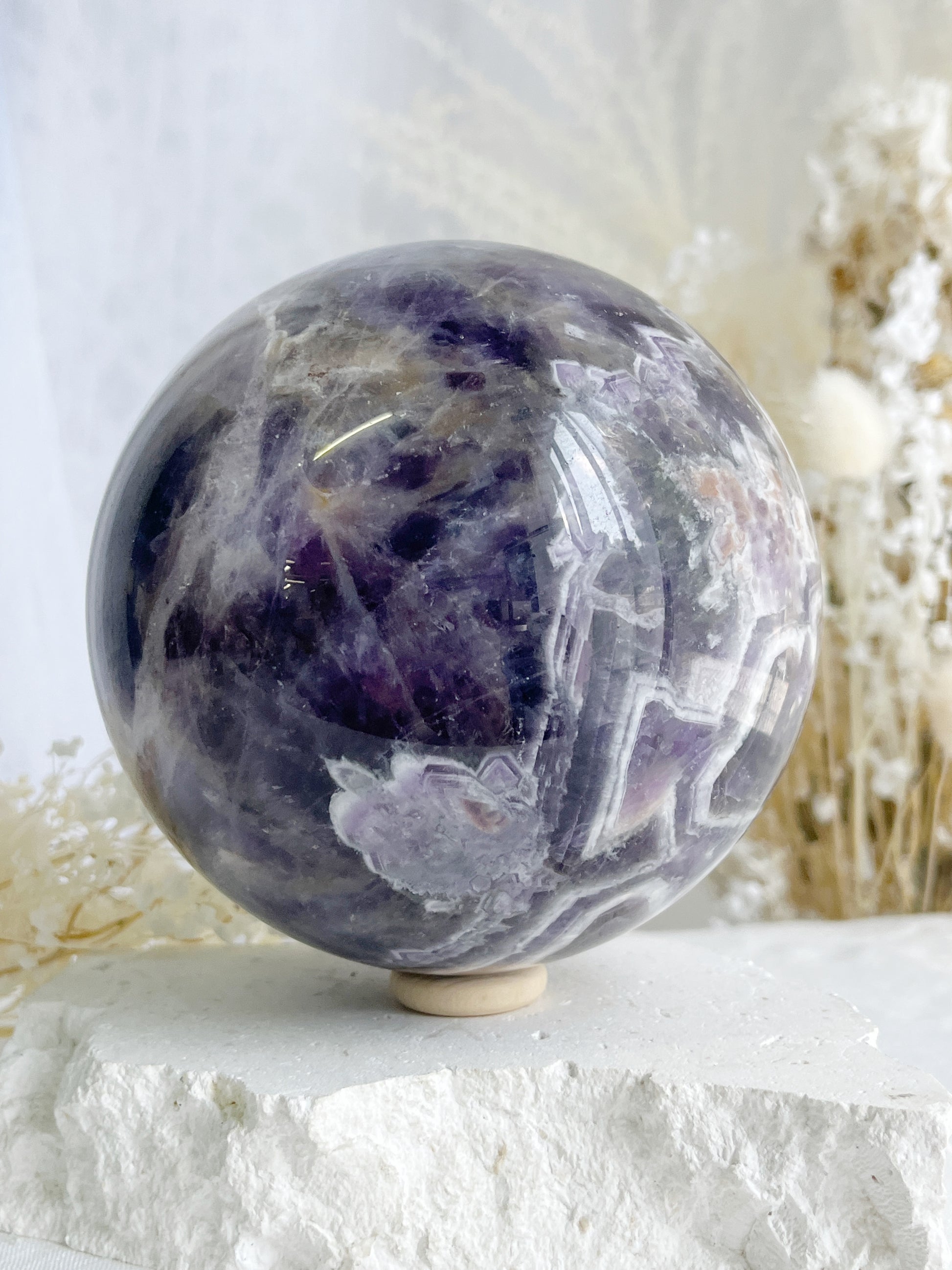 DREAM AMETHYST SPHERE APPROX 11CM. STONED AND SAGED AUSTRALIA.