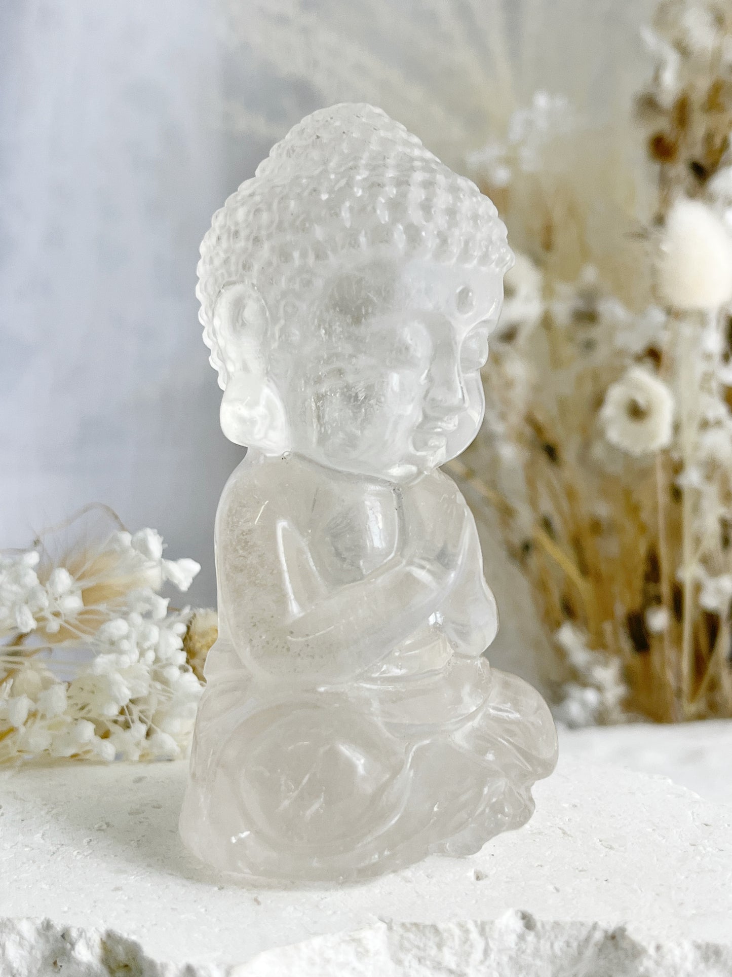 CLEAR QUARTZ BUDDHA. APPROX 10CM. STONED AND SAGED AUSTRALIA.