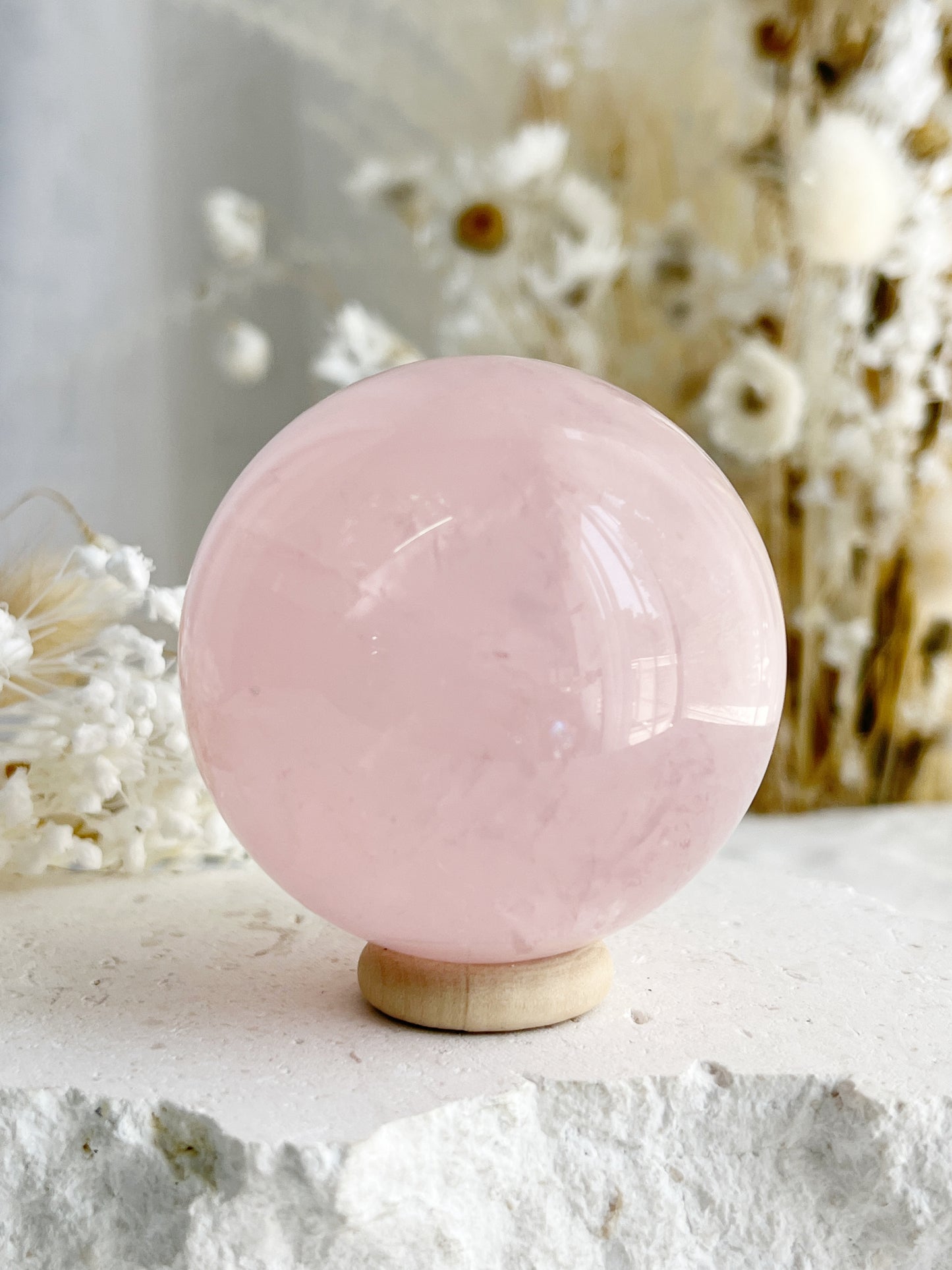 ROSE QUARTZ SPHERE APPROX 5.7CM. STONED AND SAGED AUSTRALIA.