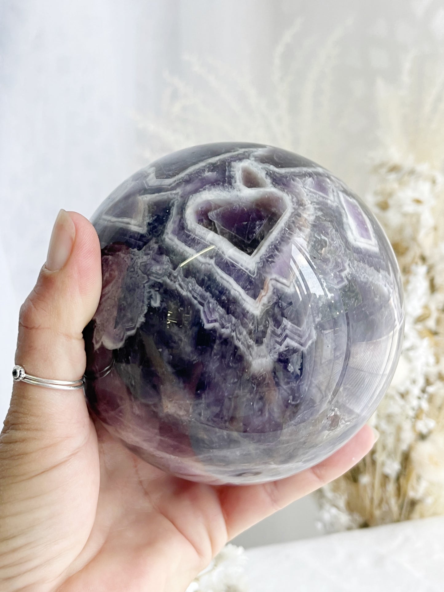 DREAM AMETHYST SPHERE APPROX 11CM. STONED AND SAGED AUSTRALIA.