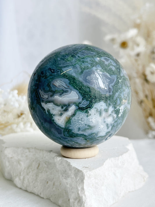 MOSS AGATE SPHERE APPROX 6.4CM. STONED AND SAGED AUSTRALIA.