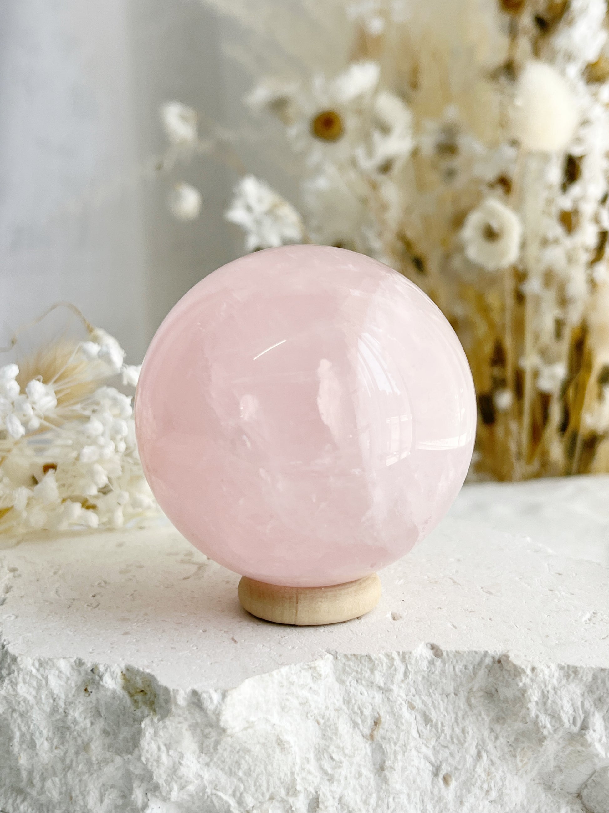 ROSE QUARTZ SPHERE APPROX 5.7CM. STONED AND SAGED AUSTRALIA.