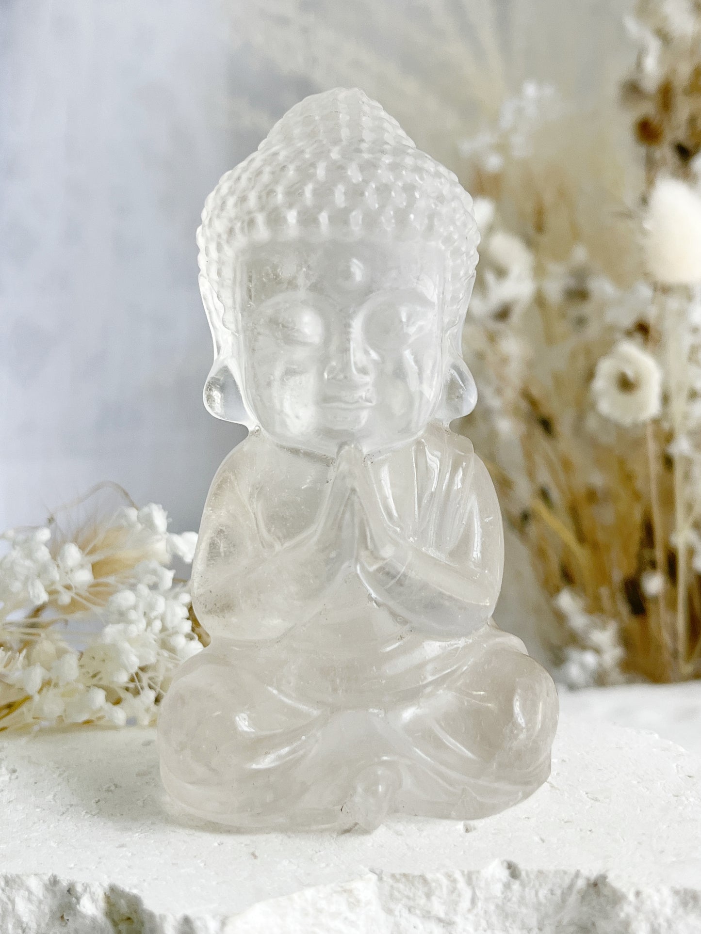 CLEAR QUARTZ BUDDHA. APPROX 10CM. STONED AND SAGED AUSTRALIA.