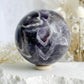 DREAM AMETHYST SPHERE APPROX 7.9CM. STONED AND SAGED AUSTRALIA.